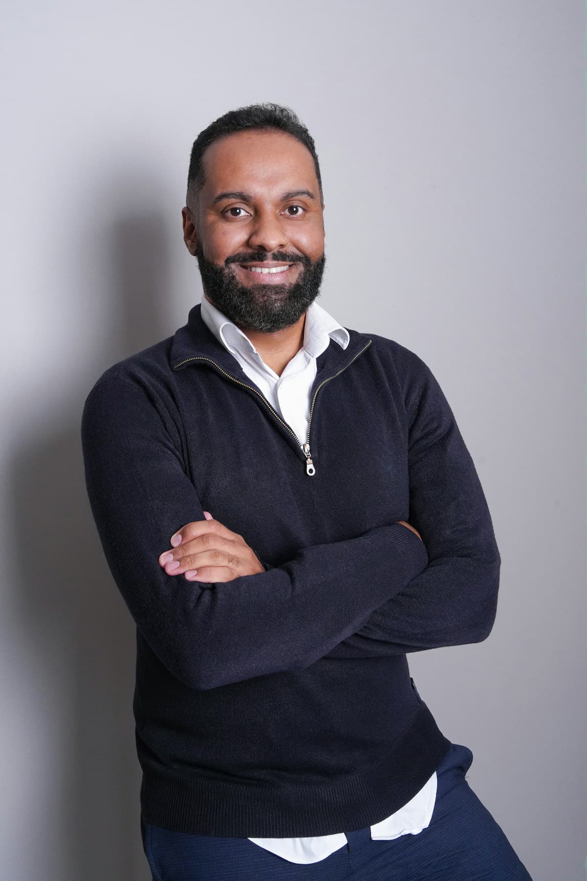 Temporary portrait placeholder; not a photograph of this team member